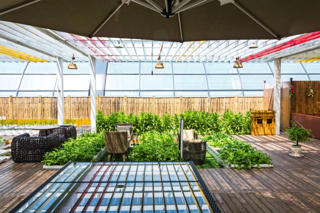 Indoor-outdoor living space with sunroom addition