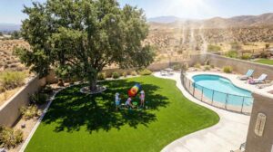 Artificial turf in hot Inland Empire summer with shade structures